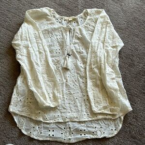 Love stitch cream eyelet top with tie along neckline. Size small.